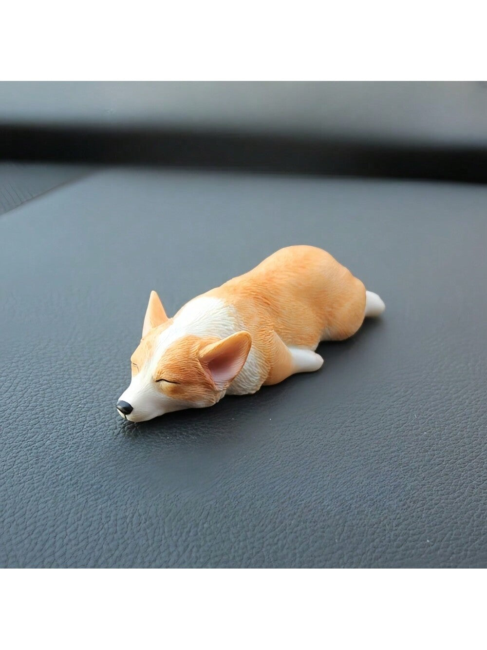 Add some cuteness to your car with our Adorable Miniature Corgi Car Decoration. This perfect birthday gift for Tesla enthusiasts features an adorable corgi design that will make your car stand out. Made with high-quality materials, this decoration is sure to bring a smile to your face every time you hit the road.