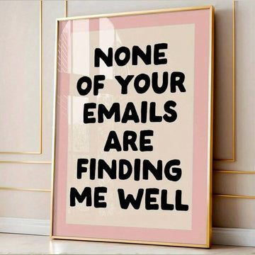 Gold frame mockup of pink retro email humor poster against a white paneled wall