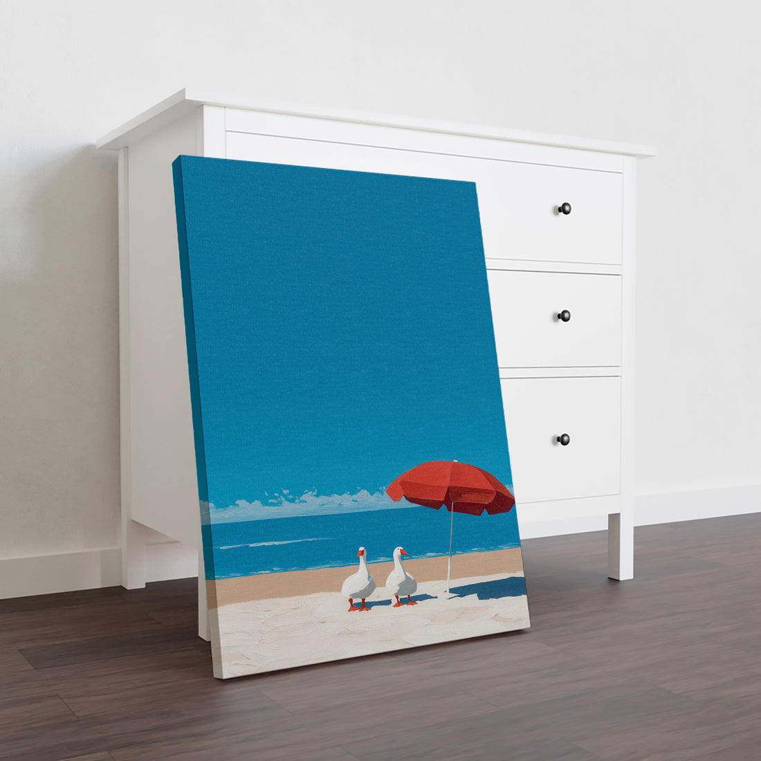 Transform your space with this charming beach scene canvas art featuring playful ducks sheltering under a vibrant red umbrella. The serene coastal palette of blues and whites creates a calming atmosphere perfect for living rooms, bedrooms, or any area needing a touch of summer tranquility. This versatile piece complements modern and traditional décor alike, serving as an ideal focal point above sofas or beside beds. High-quality canvas construction ensures lasting durability and color vibrancy. 