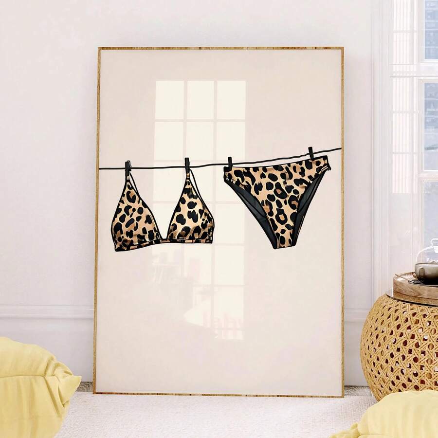 Transform your space with this striking beige leopard print bikini canvas wall art. Featuring a modern graphic design, this versatile piece brings coastal charm to beach houses, dorms, and bedrooms alike. The waterproof canvas construction ensures durability, while the removable design allows you to update your décor whenever inspiration strikes. Available in both framed and unframed options, it's the perfect statement piece for adding personality and style to any room.