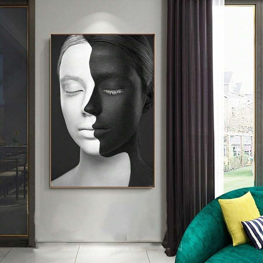Split-tone woman portrait canvas print above a teal sofa in a glamorous living room