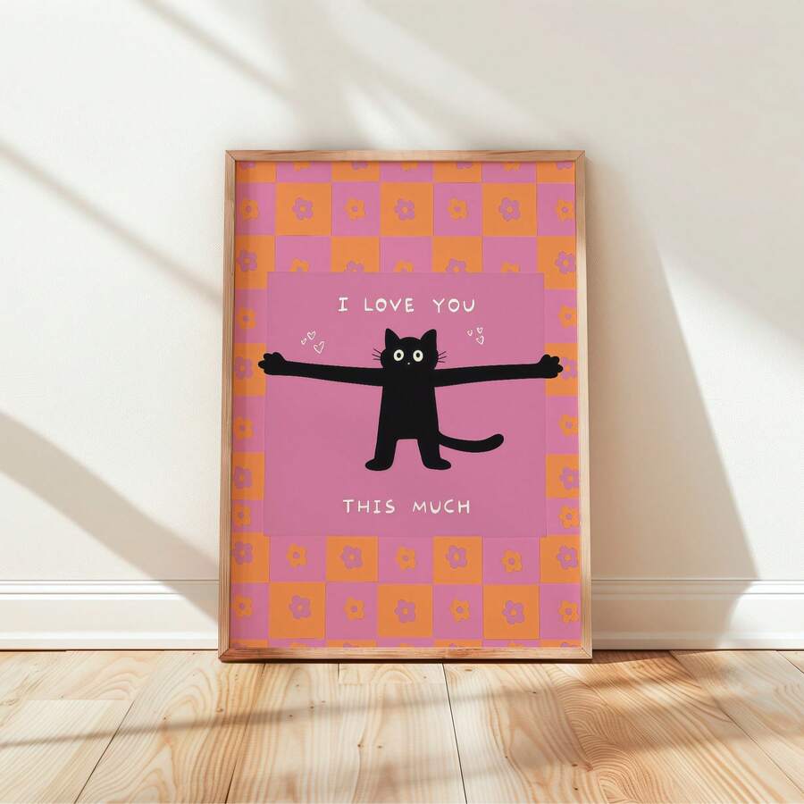 Black cat love canvas poster in a light wood frame on a sunlit wall