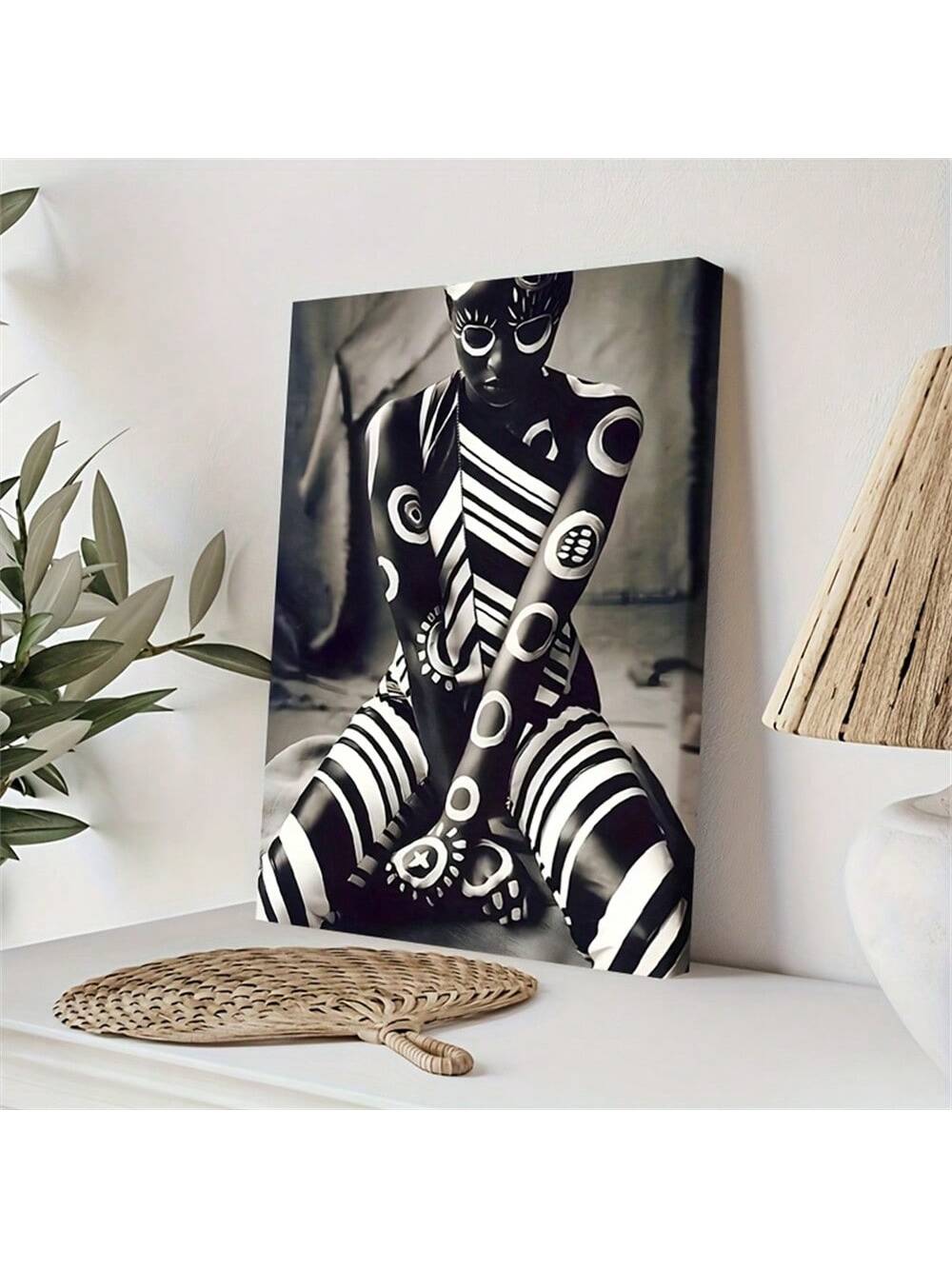 Elevate your space with this Black and White Abstract African Canvas Art Print, designed to bring a sophisticated and contemporary touch to any bedroom or living room. Its minimalist monochrome palette highlights striking abstract forms inspired by African art, making a bold statement while complementing diverse décor styles. Crafted for modern interiors, this canvas print serves as an elegant focal point that enhances your room’s ambiance with artistic depth and cultural resonance.