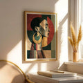 Framed geometric woman portrait with oversized gold earring beside a sunny window