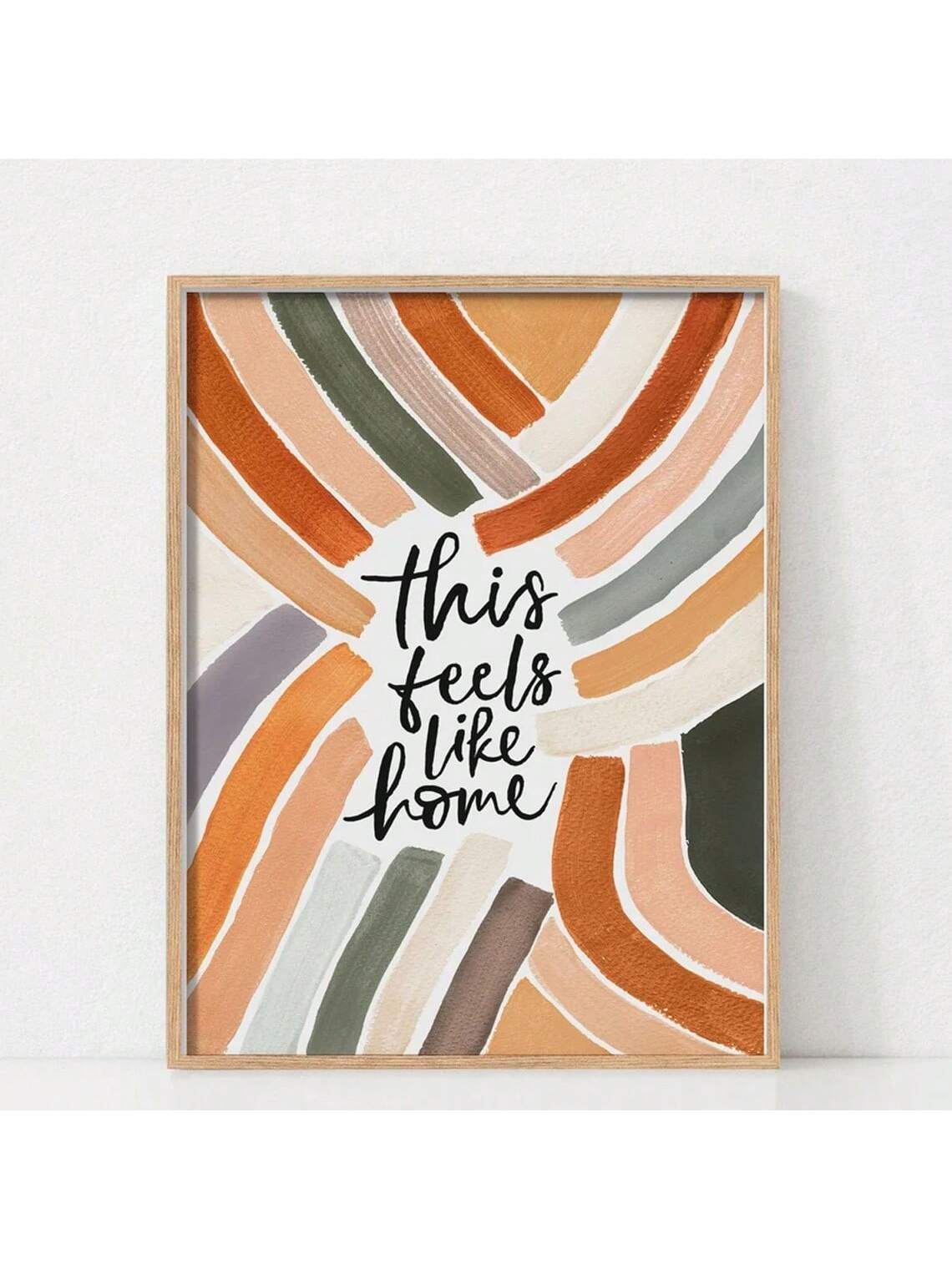 Elevate your living space with the Boho Chic 'Feels Like Home' Wall Art Print. This modern abstract piece blends warm tones and organic shapes to create a cozy, inviting atmosphere. Perfect for adding a touch of sophisticated comfort, it complements a variety of interior styles while making your home feel truly personal and welcoming. Crafted with quality materials, this print offers lasting beauty and effortless style for any room.