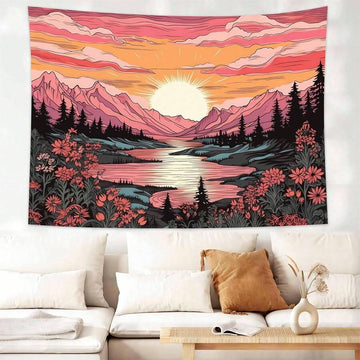 Boho mountain lake tapestry above a sofa with a warm sunset landscape