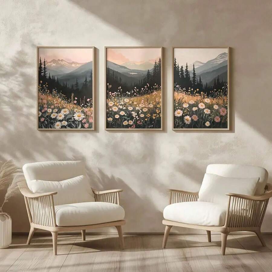 Three framed mountain and wildflower prints displayed above lounge chairs