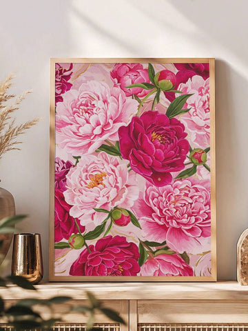 Framed pink peony and lily botanical canvas poster with layered petals and green leaves in a light wood frame
