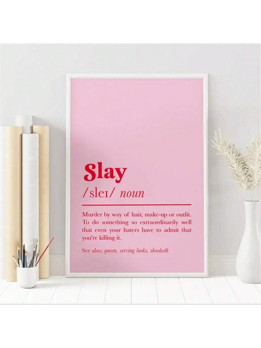 Make a bold statement with this striking canvas print featuring the word "SLAY" paired with its empowering definition. The minimalist design combines vibrant pink and red tones against a clean background, creating an eye-catching focal point that celebrates confidence and self-assurance. Perfect for bedrooms, offices, or living spaces, this modern wall art adds personality and motivation to any room. High-quality canvas construction ensures lasting color vibrancy and durability. An ideal gift for anyone who