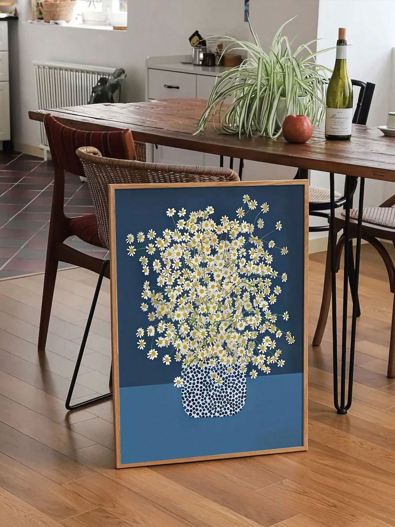 This elegant botanical wall art features a charming chamomile flower print on a canvas, adding a touch of sophistication to your home decor. The high-quality printing brings the beauty of nature to your walls, creating a tranquil atmosphere. Perfect for any room in your home, this canvas print is a timeless addition to your interior design.