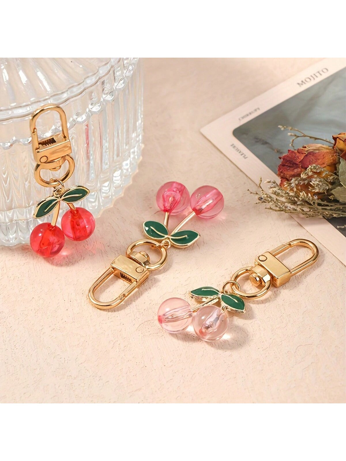 Add a touch of charm to your everyday routine with our Charming Cherry Shaped Metal Keychain. Crafted with high-quality materials, this accessory is not only visually appealing but also durable. Securely hold your keys while making a statement with its delightful design. Perfect for daily use.