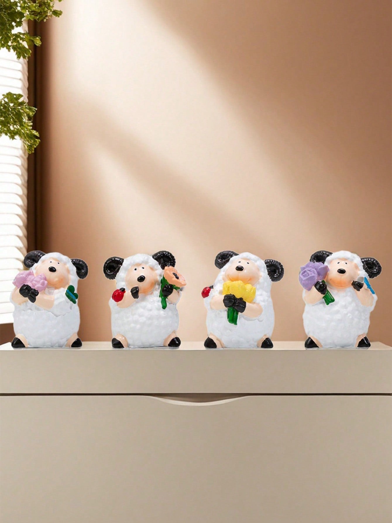 Introducing the Charming Flower Lamb Resin Decorative Ornament, perfect for elegant home décor and gift giving. This beautifully crafted lamb ornament adds charm and sophistication to any space. Made from high-quality resin, it is a durable and timeless decoration that will enhance the aesthetic of any room.