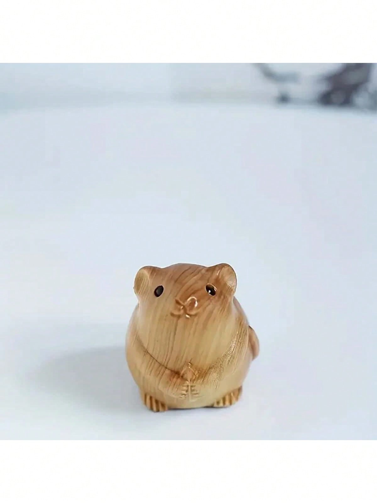 Add a touch of whimsy and charm to your home decor with this beautiful Charming Handmade Wooden Mouse Figurine. Handcrafted with care, this vintage sculpture will add a unique and rustic accent to any room. Perfect for seasonal decorating or as a permanent addition to your home.