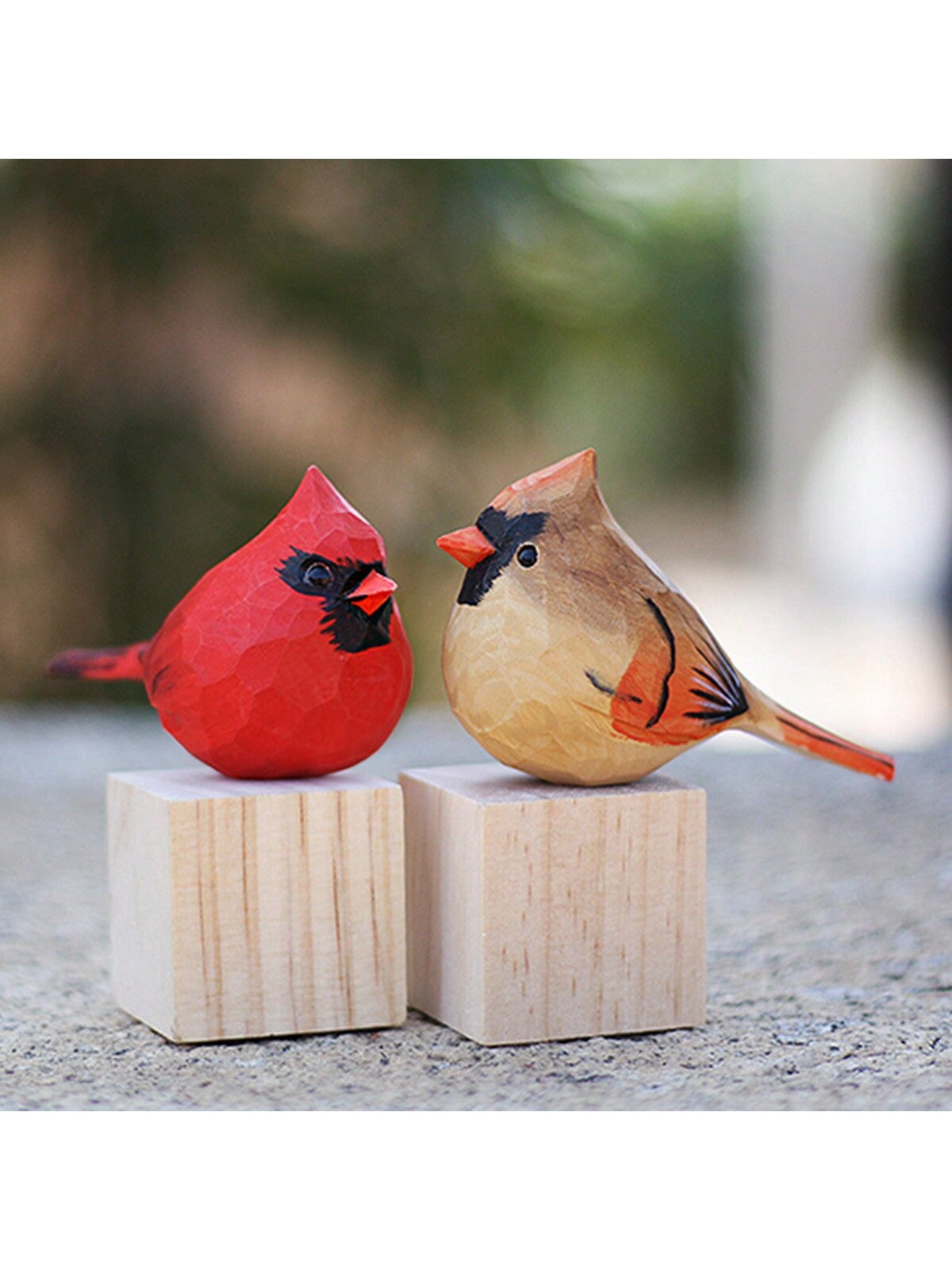 Expertly crafted and handmade, this Charming Red Cardinal Couple Resin Figurine adds a touch of beauty to any desktop. Its vibrant colors and lifelike details make for a delightful display piece, perfect for bird enthusiasts or as a thoughtful gift.