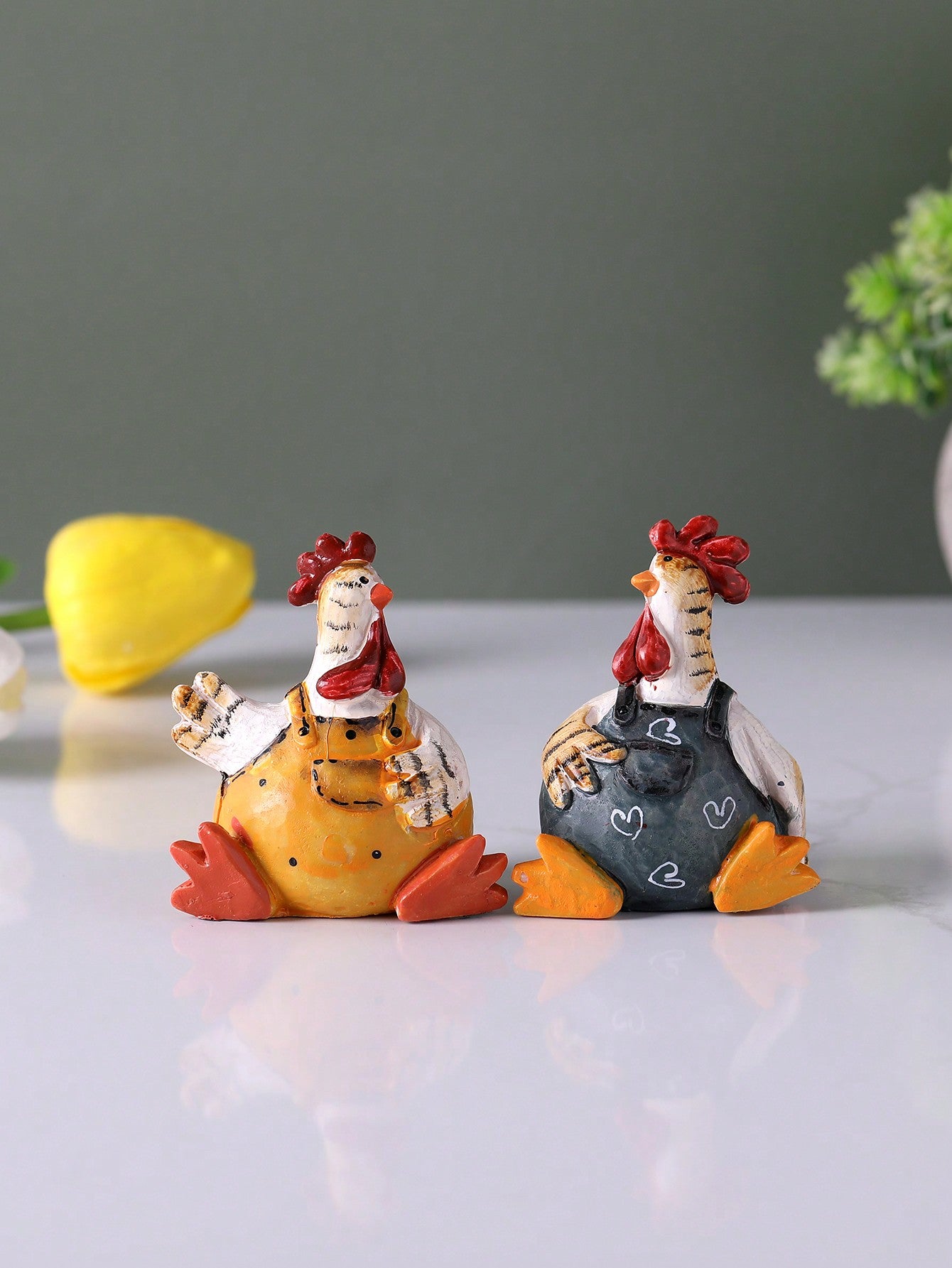 Unleash the festive spirit in your home with our charming resin Easter chicken figurine. Perfect for home decor or gifting, this adorable piece adds a touch of whimsy and joy to any Easter celebration. Made with high quality resin, it's durable and long-lasting.