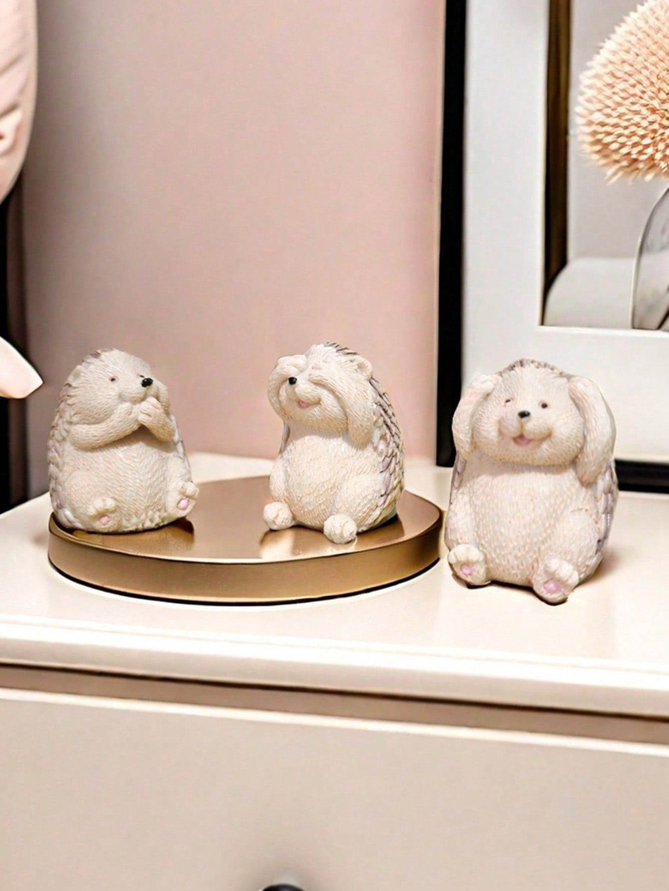 Introducing the Charming Set of 3 Hedgehog Micro Landscape Ornaments, the perfect resin decor for your home and a unique gift idea. These adorable ornaments will add a touch of charm to any indoor or outdoor space. Each set includes three different hedgehog designs, adding variety and personality to your decor. Made with high-quality resin, these ornaments are durable and long-lasting. Bring a smile to your face and those around you with these delightful decorations.