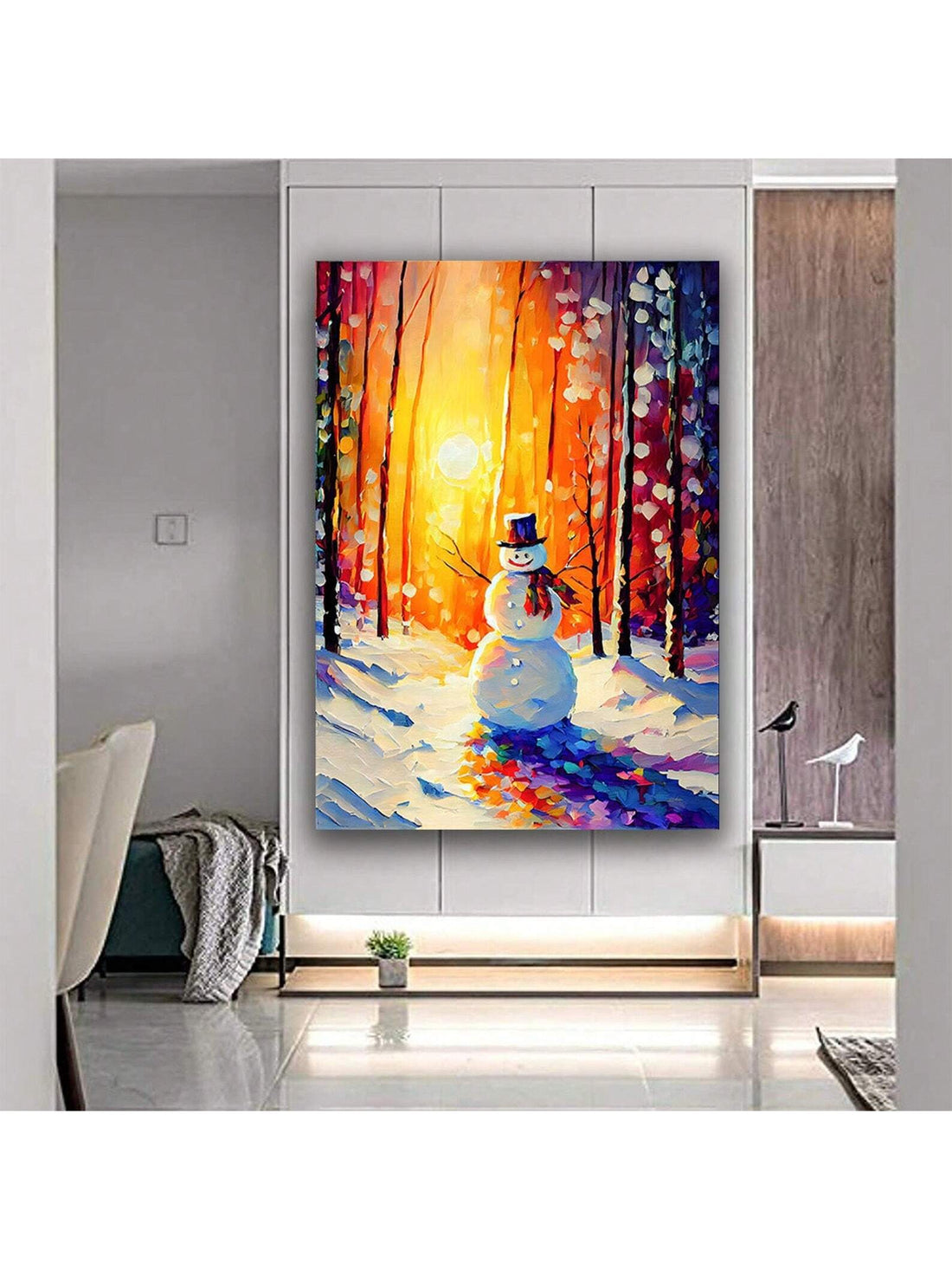 This charming canvas print showcases a delightful snowman admiring a beautiful winter sunset. Perfect for adding a festive touch to any space, this wall art captures the magic and wonder of the holiday season. Crafted with high-quality materials, this print is sure to bring joy and warmth to any room.
