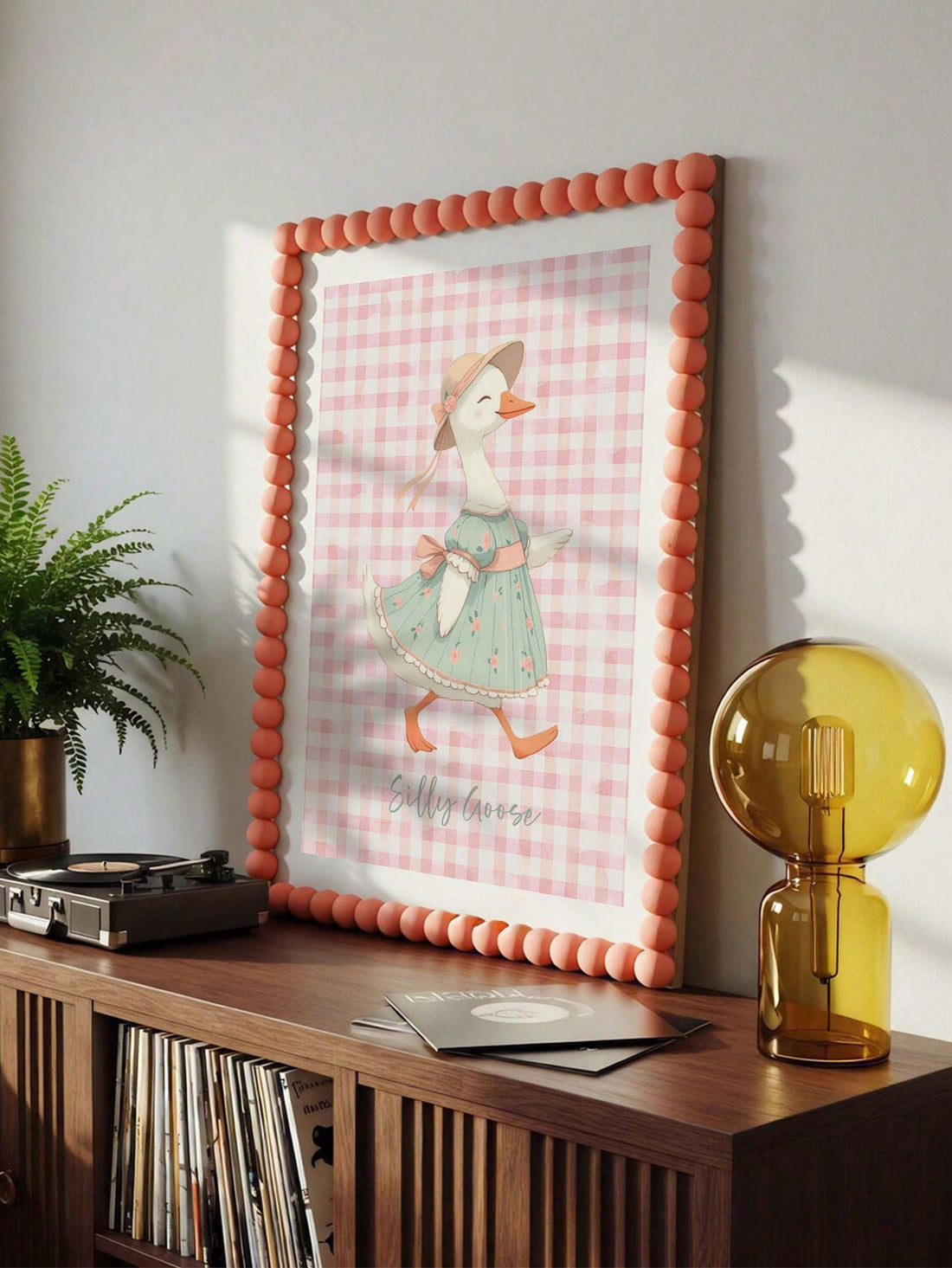 Add a touch of vintage farmhouse charm to any space with this Silly Goose canvas poster. Its whimsical design brings warmth and playful elegance, making it perfect for girls' nurseries or family rooms. Crafted to enhance your decor, this artwork adds both character and a gentle, inviting atmosphere.
