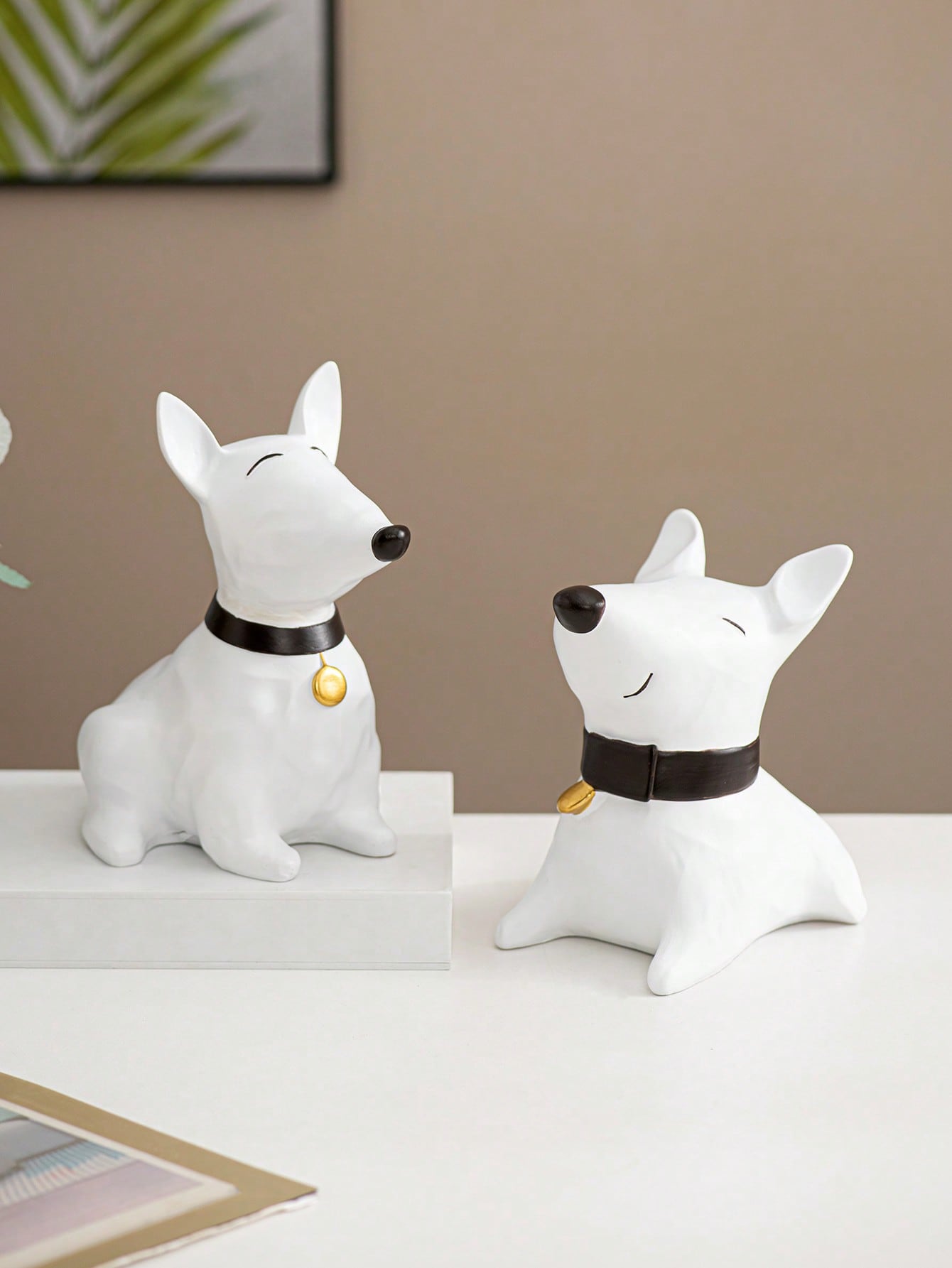 Enhance your home decor with this charming white resin dog decoration. Perfect for Easter, this decorative piece adds a touch of whimsy to any room. Made from high-quality resin, this dog figurine boasts durability and intricate detailing. A must-have for dog lovers and a delightful addition to any decor.