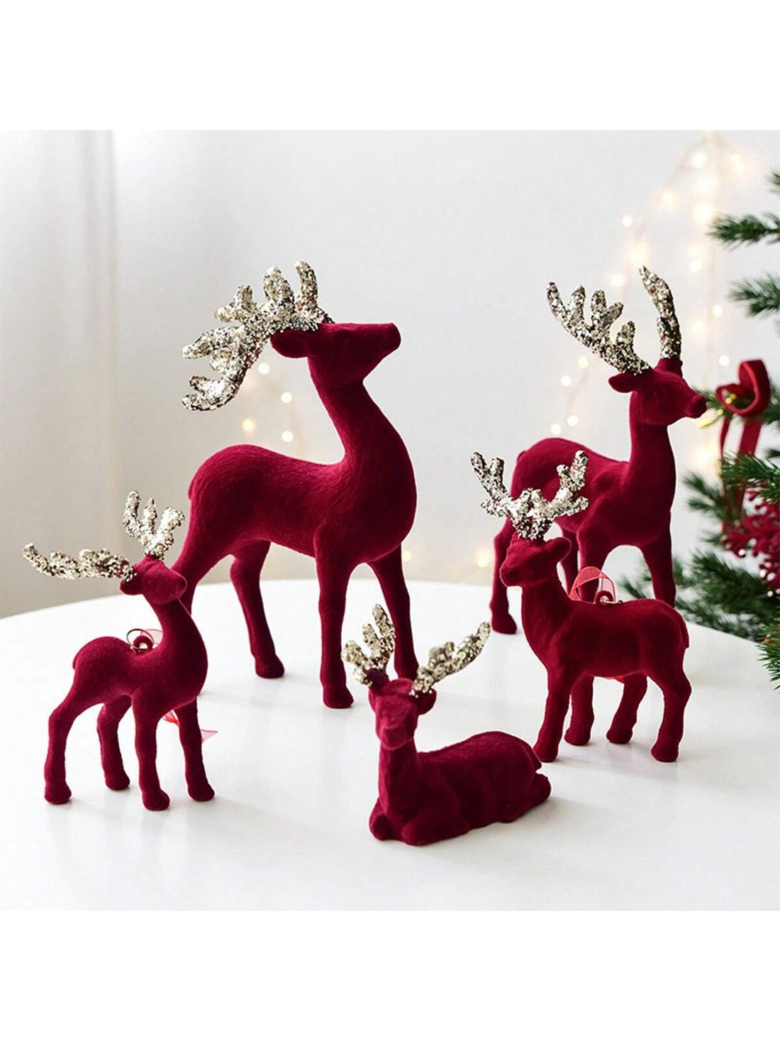 Elevate your holiday décor with these exquisite wine red reindeer ornaments, meticulously crafted with premium flocking that delivers a luxurious velvet-like texture. Each elk-inspired pendant combines traditional Christmas charm with contemporary design sensibilities, making them versatile additions to any festive display. The rich burgundy hue complements both classic and modern tree arrangements while the delicate flocking technique ensures durability and visual depth.