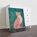 Transform your living space into a lush tropical jungle with our Cheetah Wall Art Canvas Print. Featuring vibrant shades of teal and pink, this piece adds a pop of color and a touch of nature to any room. Perfect for living rooms, sofas, and bedside decor.