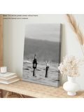 Add a touch of sophistication to your home or office with this Chic Beach Scene Canvas Print. Featuring a stylish woman with champagne, this wall art will elevate any space. Made with high-quality materials and vibrant colors, it is the perfect addition to your decor.