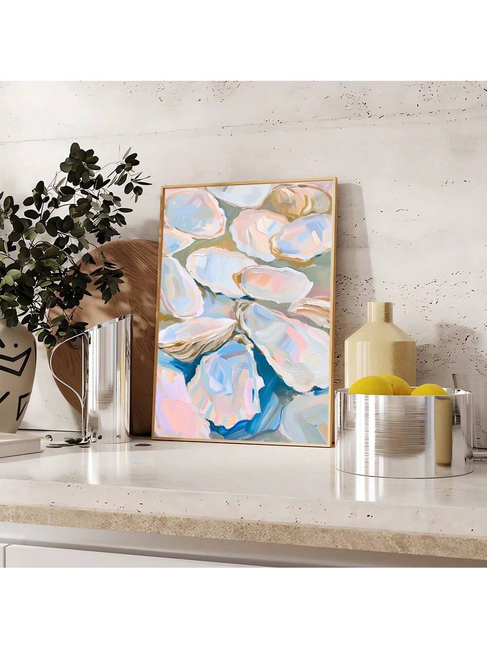 Transform your home into a chic coastal retreat with this stunning abstract canvas art featuring oyster shells. Hand-painted to perfection, this piece evokes a sense of calmness and elegance. Elevate your home decor with the beauty of the ocean and add a touch of sophistication to any room.