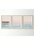 Elevate your living or bedroom space with the Coastal Serenity set, featuring three expertly crafted ocean sunset prints. These artworks capture the calming hues and tranquil ambiance of the seaside at dusk, providing a sophisticated and harmonious focal point. Perfect for creating a serene atmosphere, this set blends effortlessly with modern and coastal interior styles to enhance your decor with refined elegance.