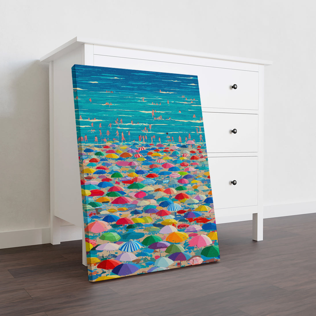 Transform your space with this vibrant canvas wall art featuring a stunning summer ocean scene. The composition showcases colorful beach umbrellas set against a serene coastal backdrop, bringing warmth and vacation-inspired charm to any room.