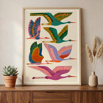 Crane wall art with colorful flying birds in teal green pink orange blue and cream