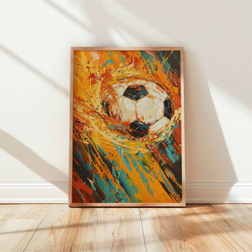 Framed football canvas with swirling orange and teal paint on a bright wall