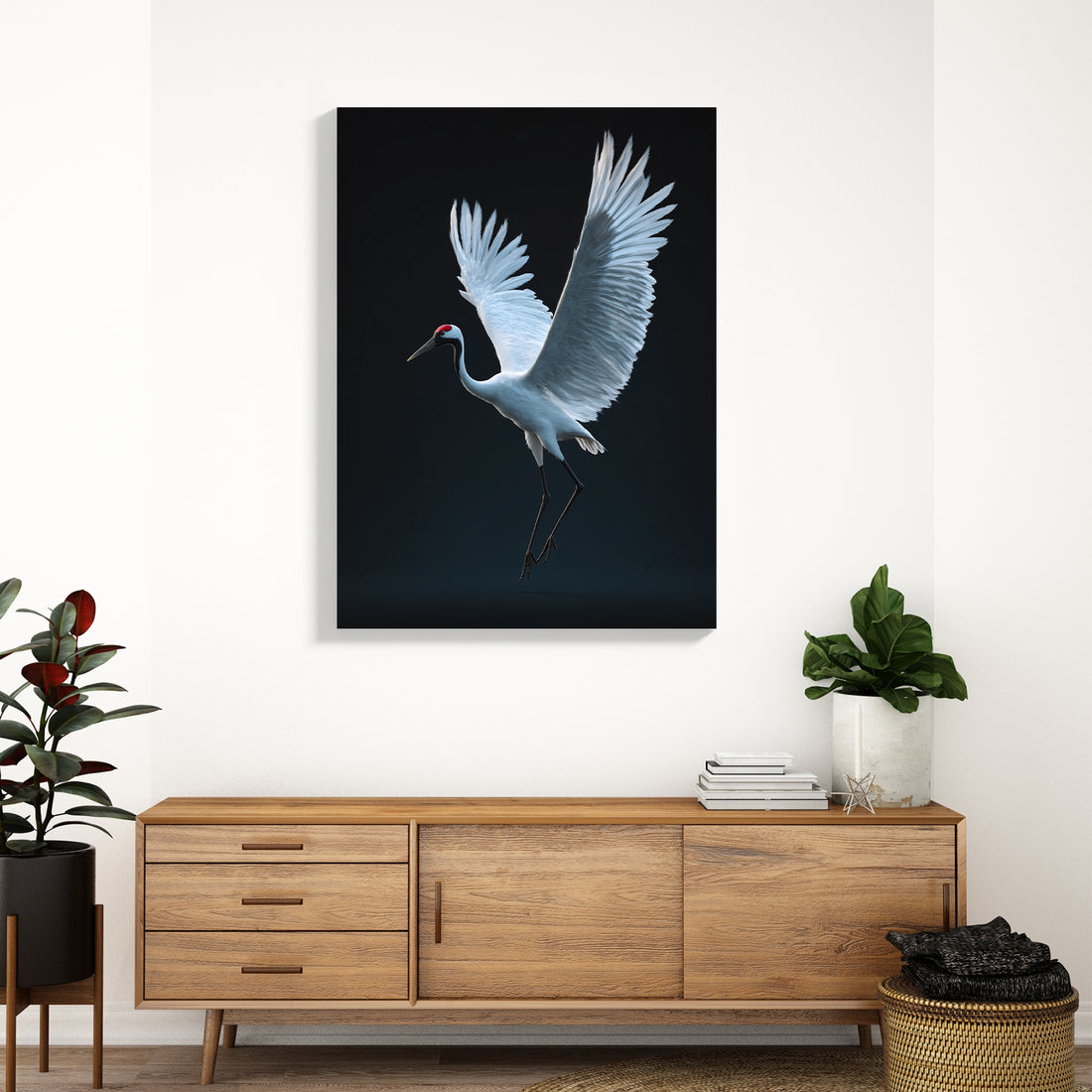 This striking canvas print captures an elegant white crane in dramatic contrast against a deep black background, creating a sophisticated focal point for any interior space. The minimalist composition draws the eye with its refined simplicity, making it ideal for modern and contemporary settings.