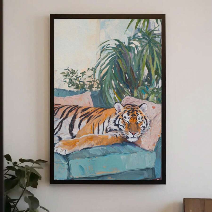 Black framed tiger painting on a white wall with teal sofa and tropical plants