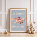 Pastel vintage airplane canvas print displayed in a playful nursery with toys and blocks