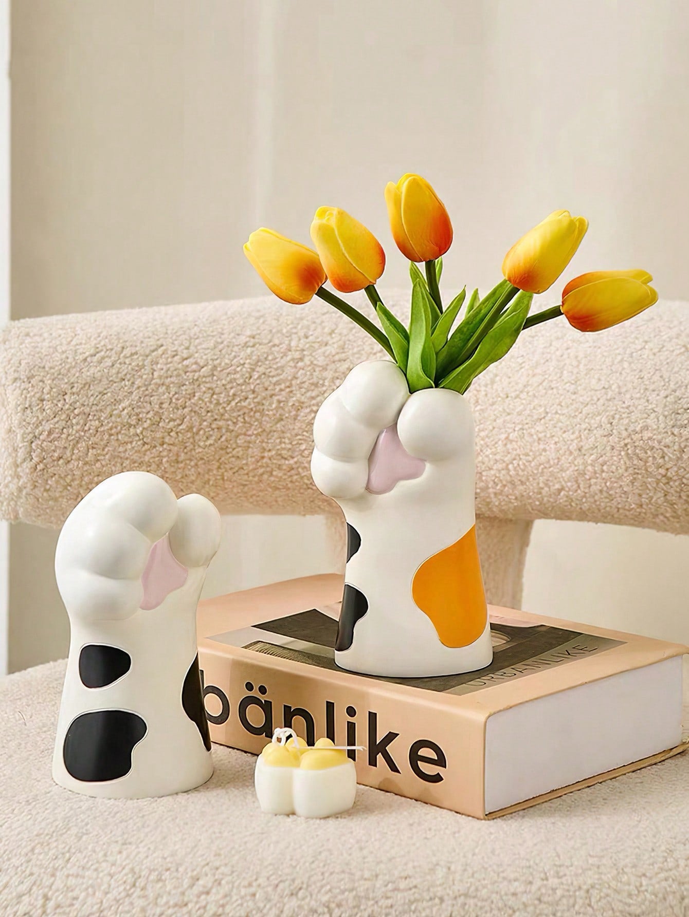 Elevate your home decor with our Cute Cat Gourd Vase - a whimsical and functional addition to any room. Made of durable polyresin, it's perfect for displaying flowers or organizing pens and brushes. With its adorable cat design, this vase is sure to bring a touch of charm to your space.
