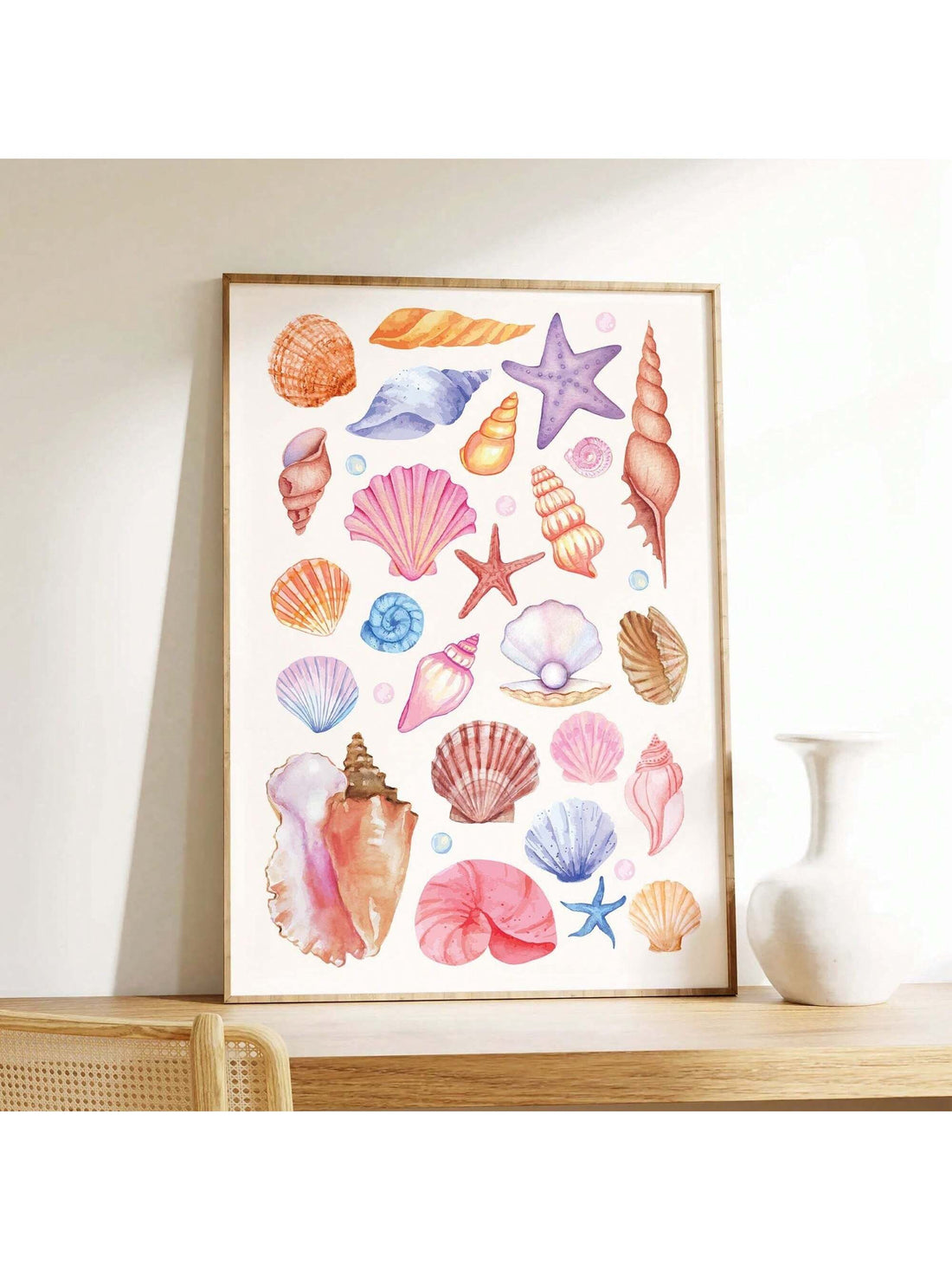 Enhance your living space with this expertly crafted Cute Coastal Seashells Wall Art. Featuring a vibrant summer canvas print, it brings the serene beauty of the beach indoors. Perfect for beach-themed decor, this artwork adds a refreshing coastal touch that complements any room with subtle elegance and seasonal charm.
