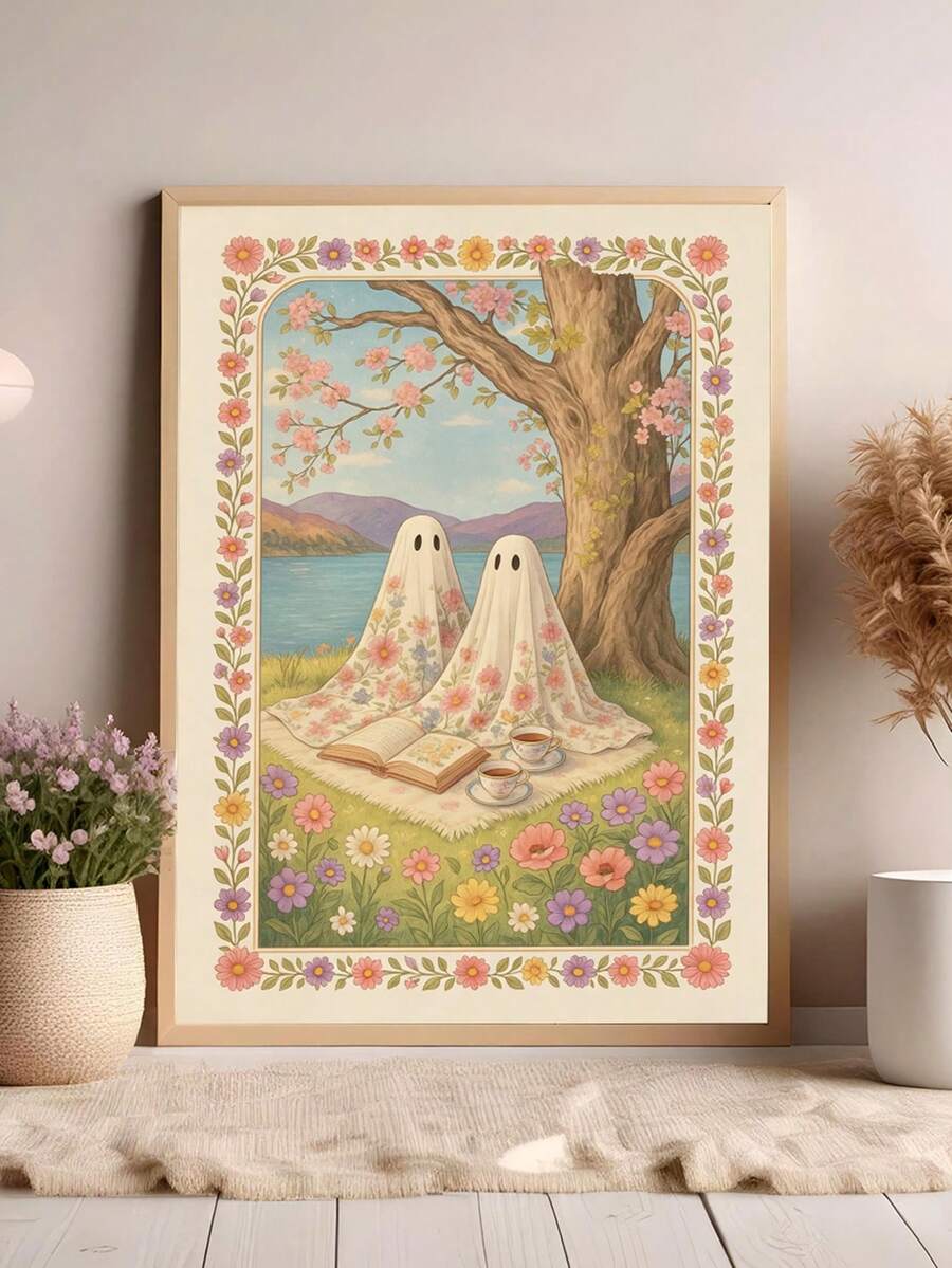 Framed floral ghost picnic art with books and tea beside a blossom tree