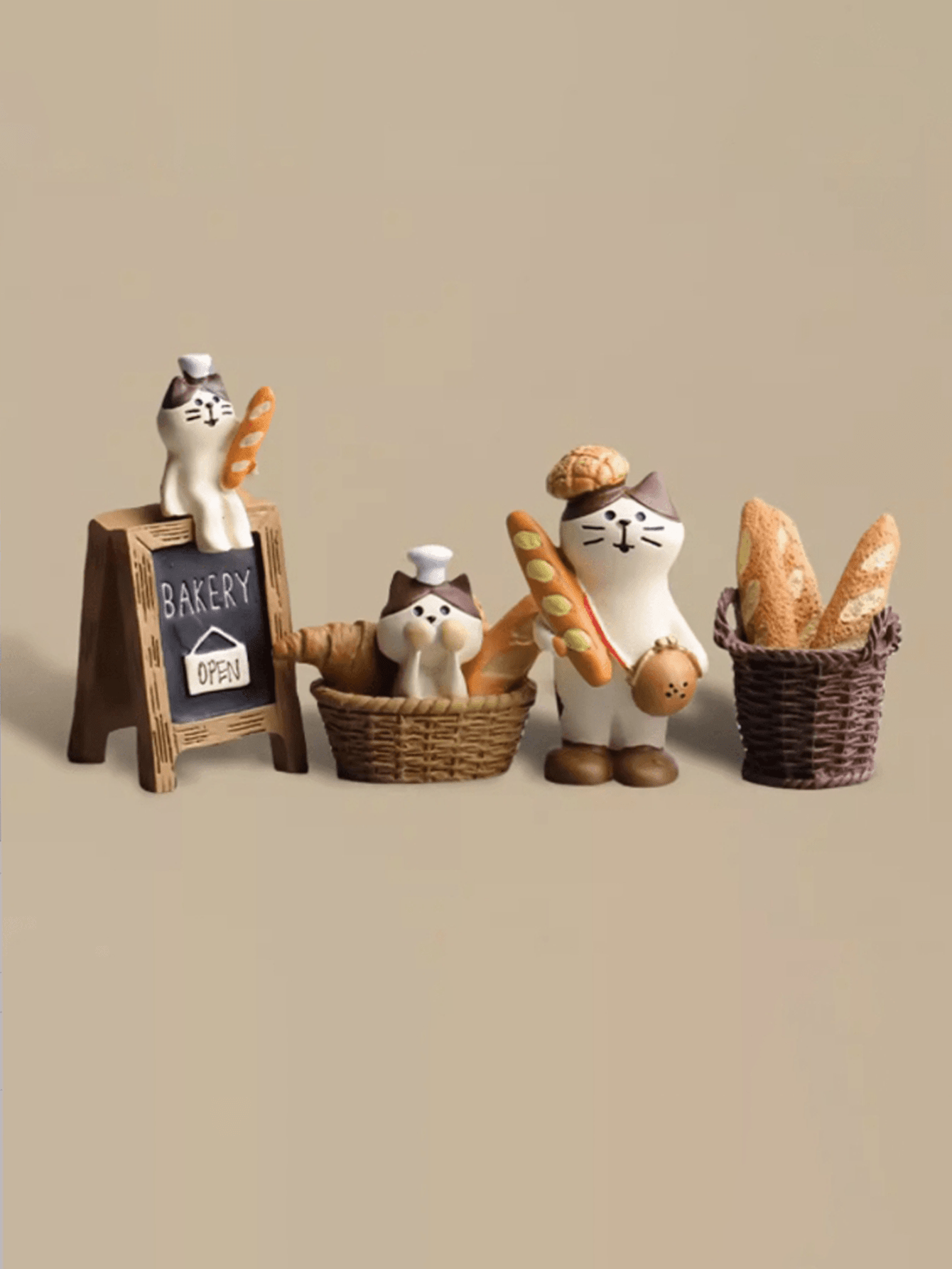 Add a playful touch to your workspace or car interior with our Cute Resin Cat Figure Desk Decor! This adorable set of cat figures will bring a smile to your face while keeping your desk or car organized. Made from high-quality resin, these figures are durable and long-lasting. Perfect for cat lovers and those seeking a unique and charming decor piece.