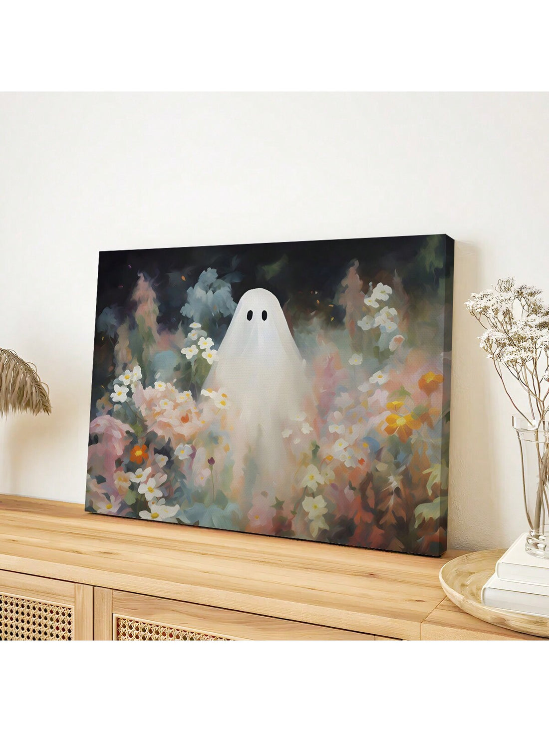 Enhance the ambiance of any space with our Cute White Ghost With Flowers Canvas Poster. Perfect for living rooms, bedrooms, offices, restaurants, and bars, this charming poster adds a touch of whimsy and style. Made with high-quality canvas, it is durable and adds a unique touch to your wall.