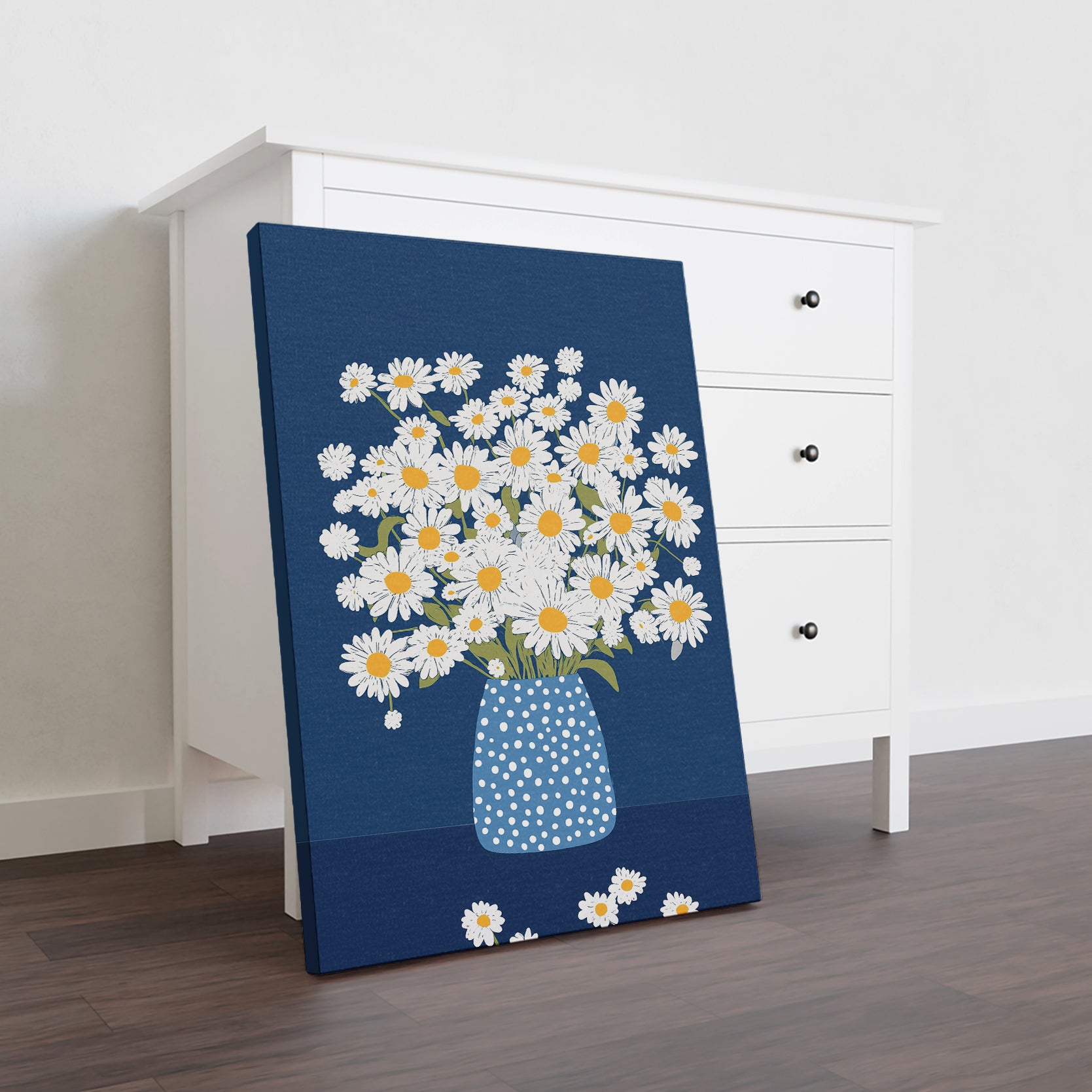 Add a touch of elegance to your living room or bedroom with our Daisy Floral Canvas Wall Art. The navy blue background and polka dot vase give this piece a classic look, making it the perfect backdrop for your sofa or bedside decoration. Elevate your home decor with this stunning piece of art.