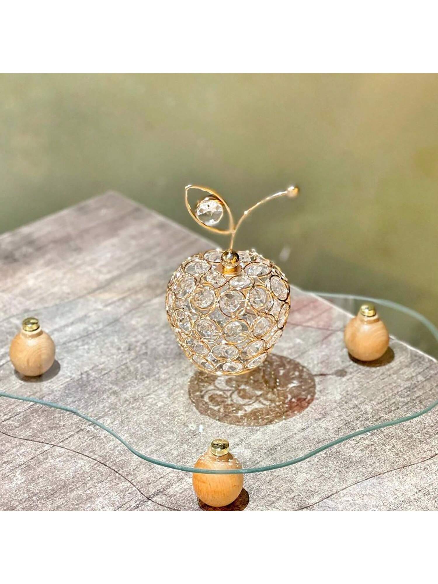 Introduce a touch of elegance to any space with our 3-piece Crystal Pineapple Candle Holder Set. Handcrafted for a unique touch, these holders make for a stunning centerpiece for any occasion. Perfect for home decor, parties, and weddings. Made with top-quality crystal for a beautiful and sophisticated look.