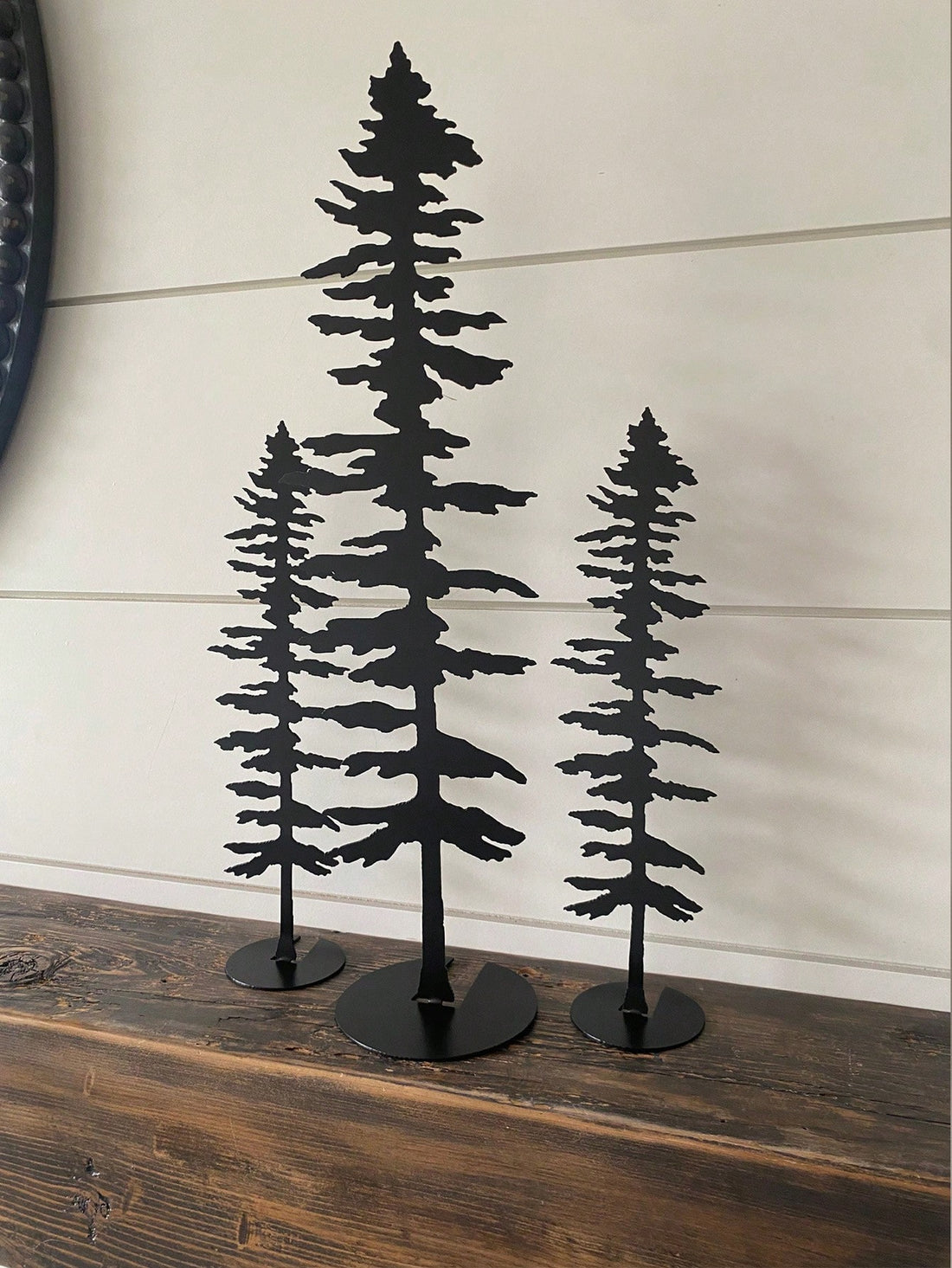 Create a nature-inspired and elegant home decor with our 3-Piece Sitka Tree Metal Wall Art Set. These beautifully crafted pieces will enhance any room's ambiance with their intricate details and unique design. Made with high-quality metal, this set is durable and long-lasting, ensuring a timeless addition to your home.
