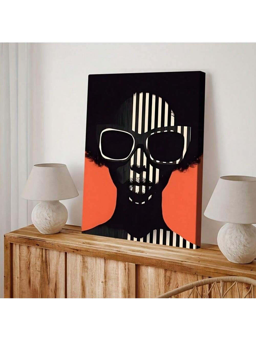 Elevate your space with this elegant abstract canvas art featuring a striking black and white palette accented by vibrant orange hues. Inspired by vintage African minimalist design, this piece brings a sophisticated yet warm atmosphere to both home and office environments. Its balanced composition and bold contrasts make it a timeless addition that complements modern and classic interiors alike. Perfect for those seeking refined artistic expression with cultural depth.