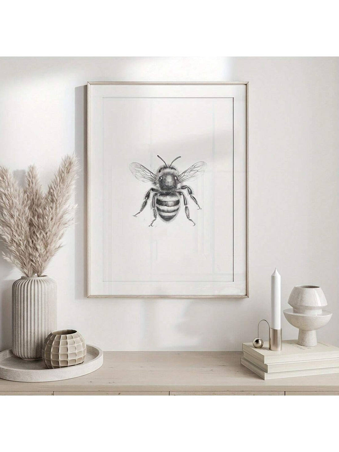 Enhance your modern home decor with our Elegant Black and White Bee Canvas Wall Art. Featuring a beautifully framed decorative insect print, this piece adds a touch of sophistication to any room. Made with high-quality materials and expert craftsmanship, this canvas art is sure to impress.