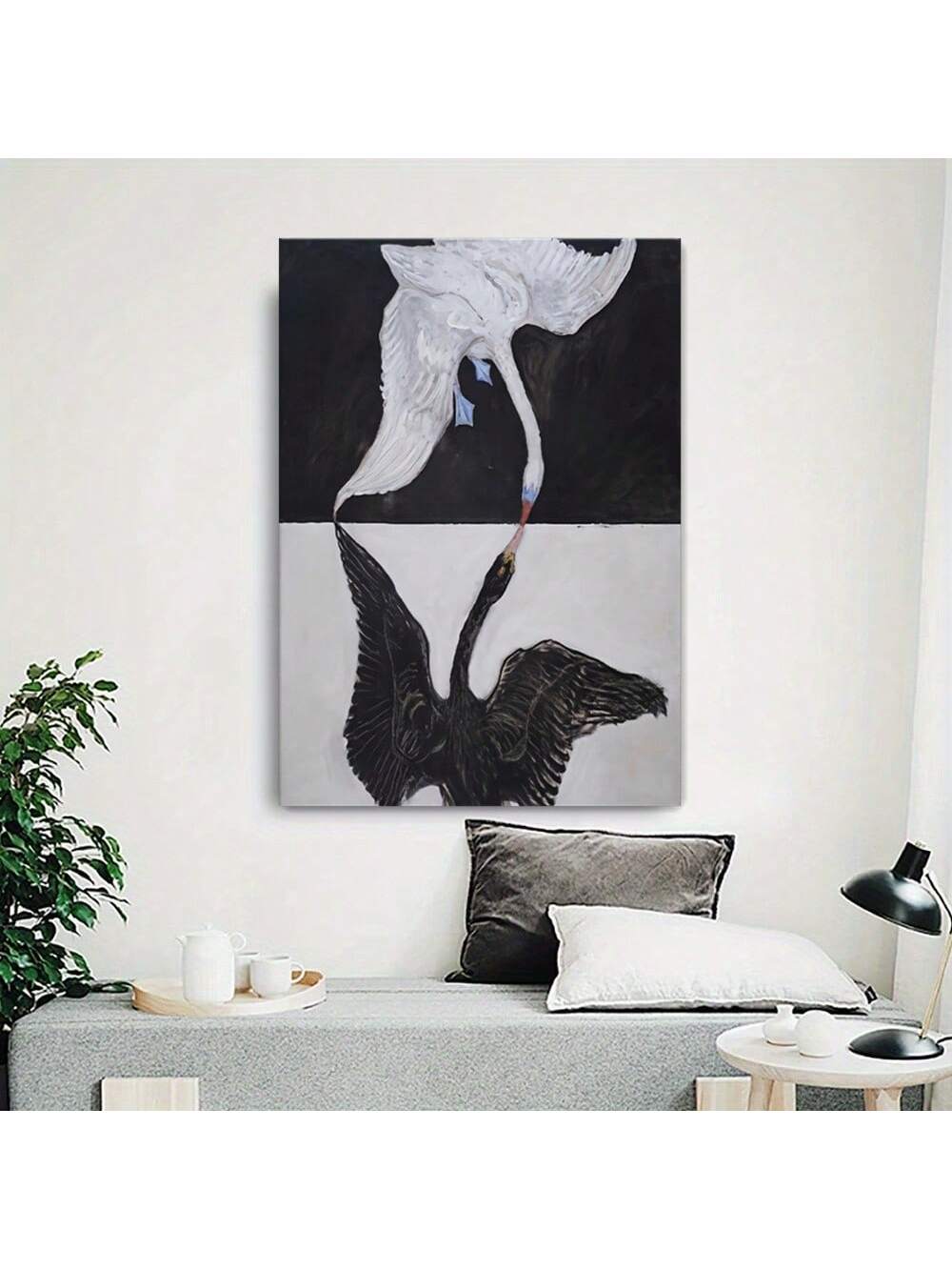 Elevate your living space with this Elegant Black and White Swan Canvas Art Print, designed to complement modern home decor. The monochrome palette highlights the graceful form of the swan, adding a sophisticated and timeless touch to any room. Crafted with high-quality materials, this canvas print ensures durability and sharp detail, making it a refined centerpiece that enhances your interior aesthetic with understated elegance.