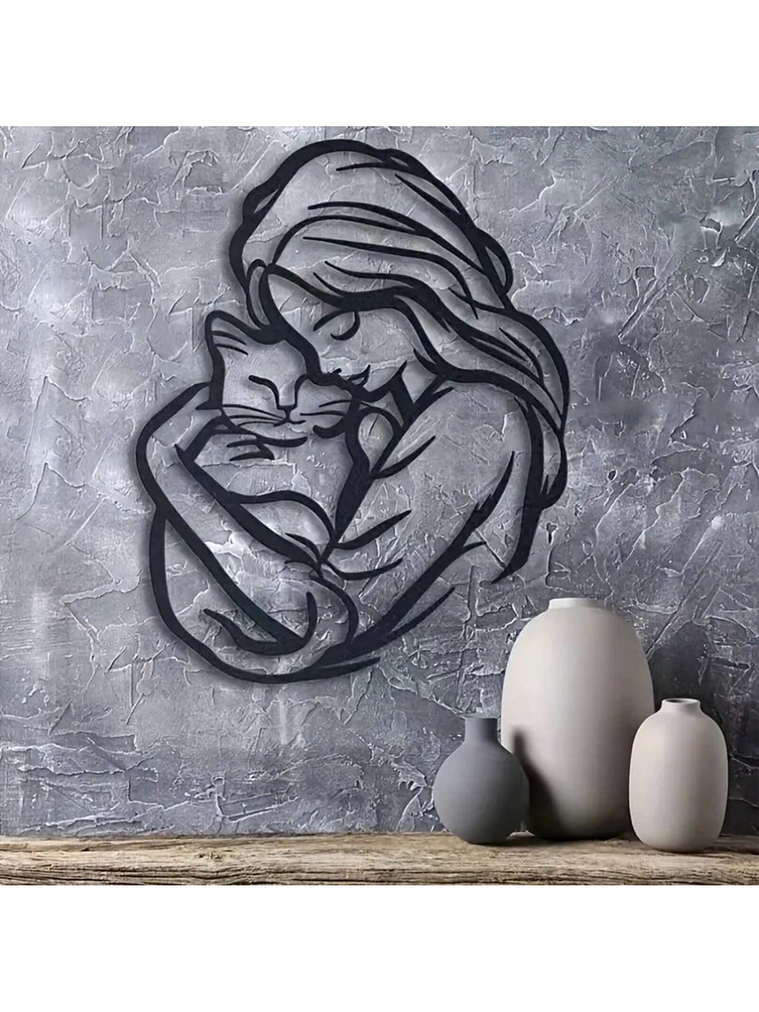 Elevate your home decor with our Elegant Cat Embrace Wall Art. Perfect for cat lovers, this silhouette design adds a touch of sophistication to any room. Made with high-quality materials, it makes for the perfect gift or home accent. Show your love for felines with this elegant piece.