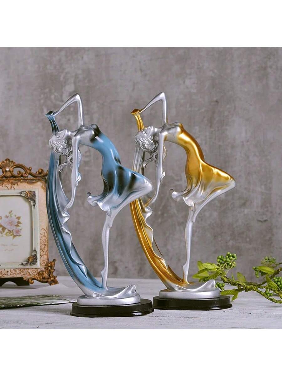 Elevate your home decor with our Elegant Dancing Statue. This modern ballet sculpture adds a touch of grace and elegance to any space. Perfect for gifting to the art lover in your life. Made with quality craftsmanship, this statue is a must-have for any home.
