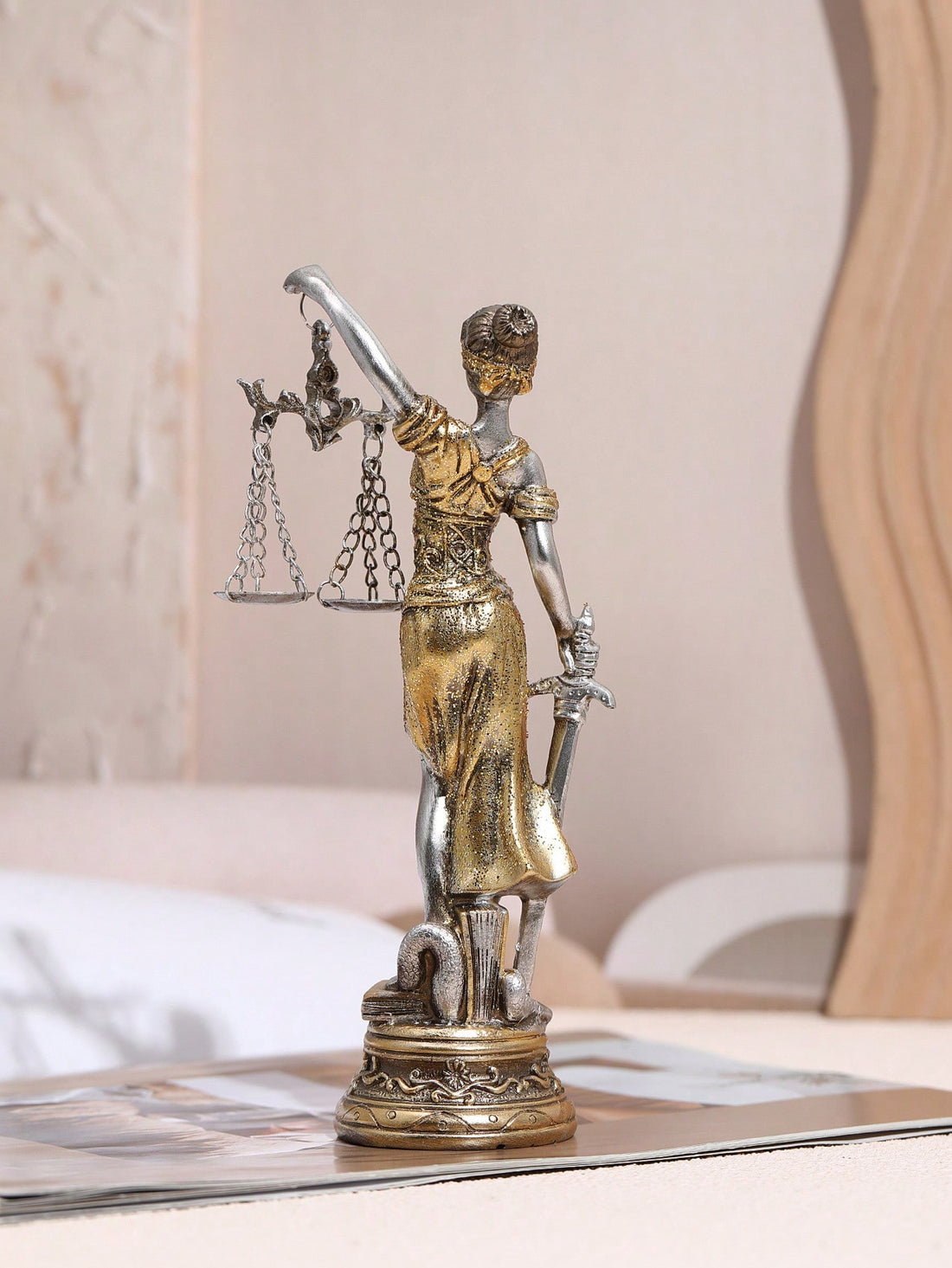 Add an elegant touch to your home office decor with our inspiring Goddess of Fairness &amp; Justice statue. Made from high-quality materials, this stunning statue not only exudes beauty but also represents fairness and balance in all aspects of life. Perfect for those seeking a touch of grace and wisdom in their work space.
