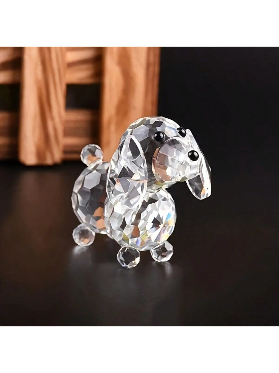 This handcrafted crystal dachshund figurine is a charming addition to any home or office decor. Made with elegant glass, this statue adds a touch of sophistication to any room. Display it proudly and admire the exquisite craftsmanship put into every detail. Perfect for dog lovers and collectors alike.