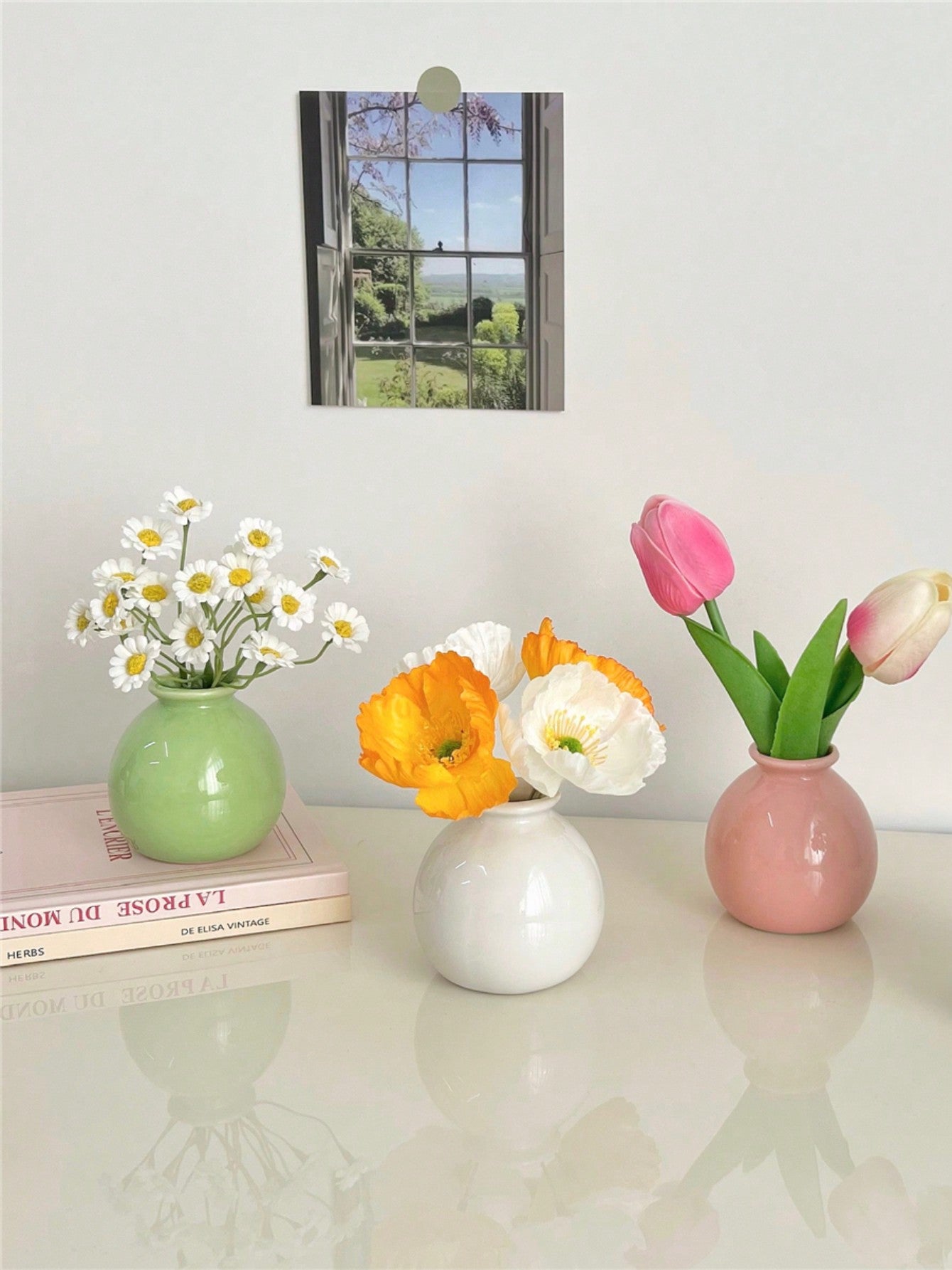 Elevate your home decor with our Elegant Mini Ceramic Round Vases. These versatile vases are perfect for displaying floral arrangements or as standalone decorative pieces. Made from high-quality ceramic, these vases bring a touch of sophistication to any room.